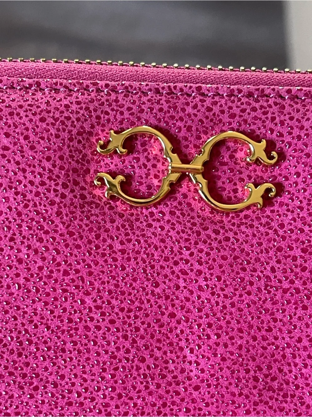 C. Wonder Fuchsia Zip-Around Wallet with Gold Logo